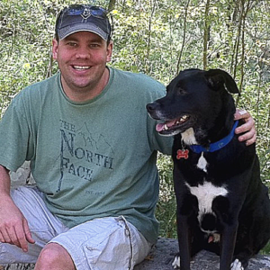 Michael Rudy with his dog, Hank